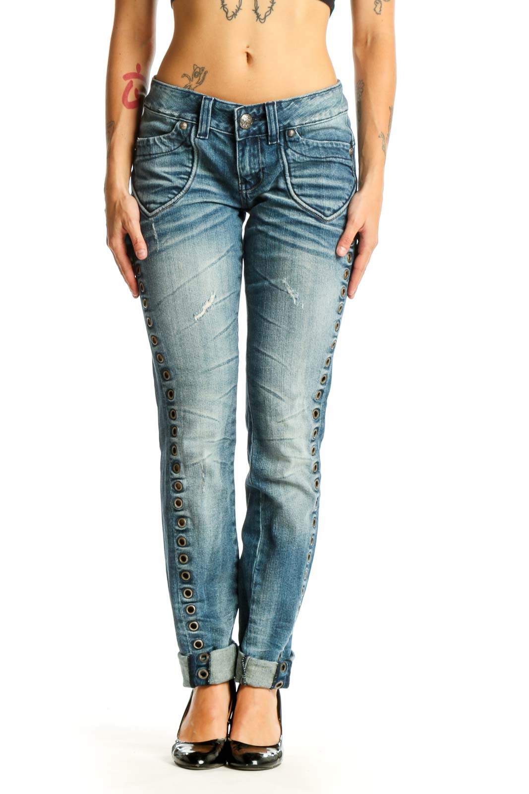 Front view of ReRock for Express blue distressed skinny jeans with studded side seams