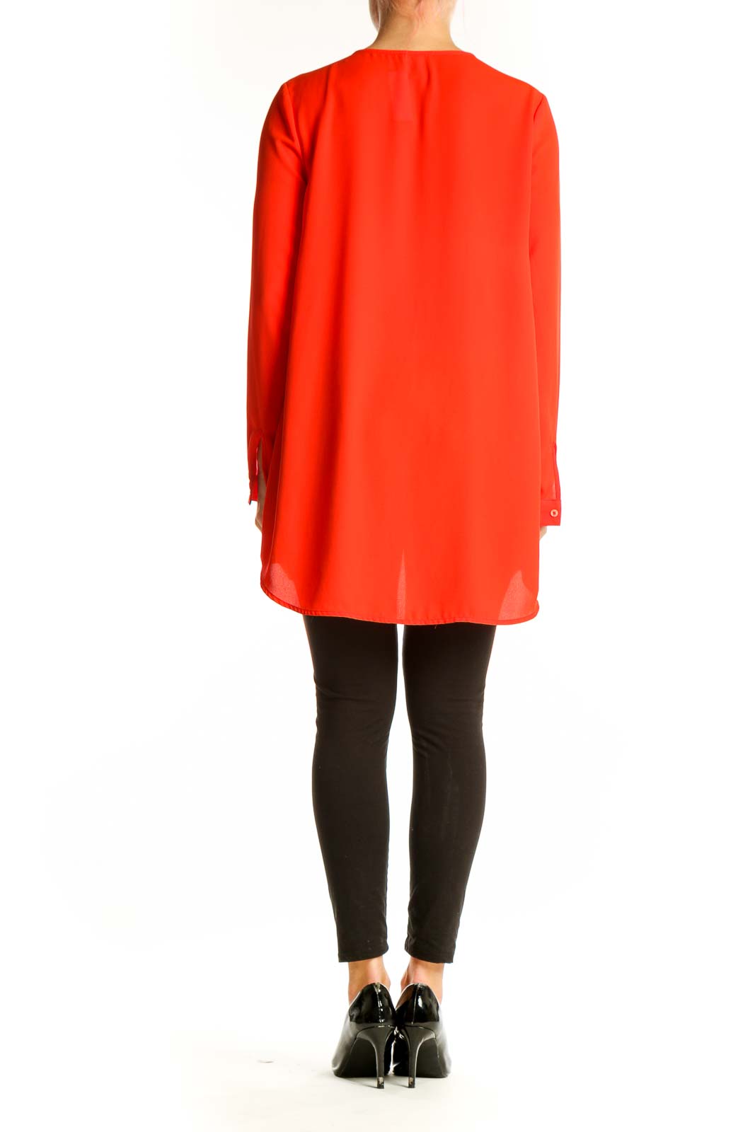 Side view of red CeCe by Cynthia Steffe long-sleeve flowy blouse with high-low hem