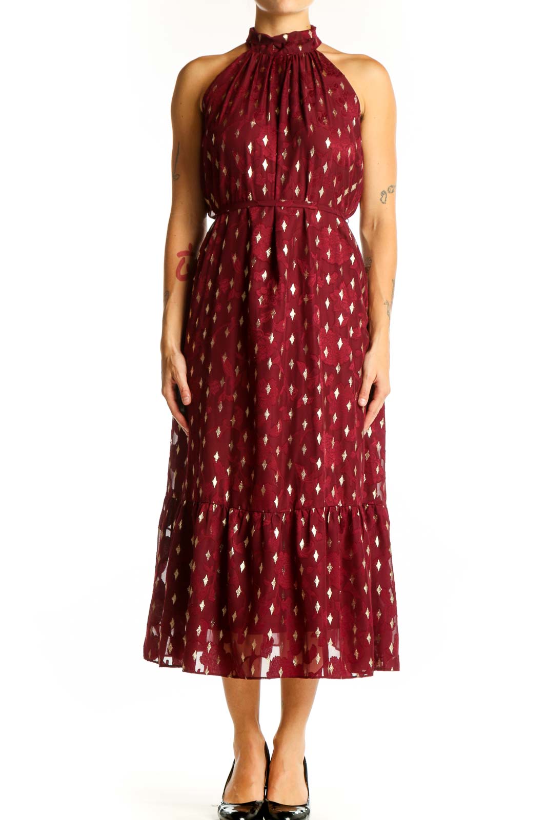 Front view of burgundy halter midi dress with gold diamond pattern