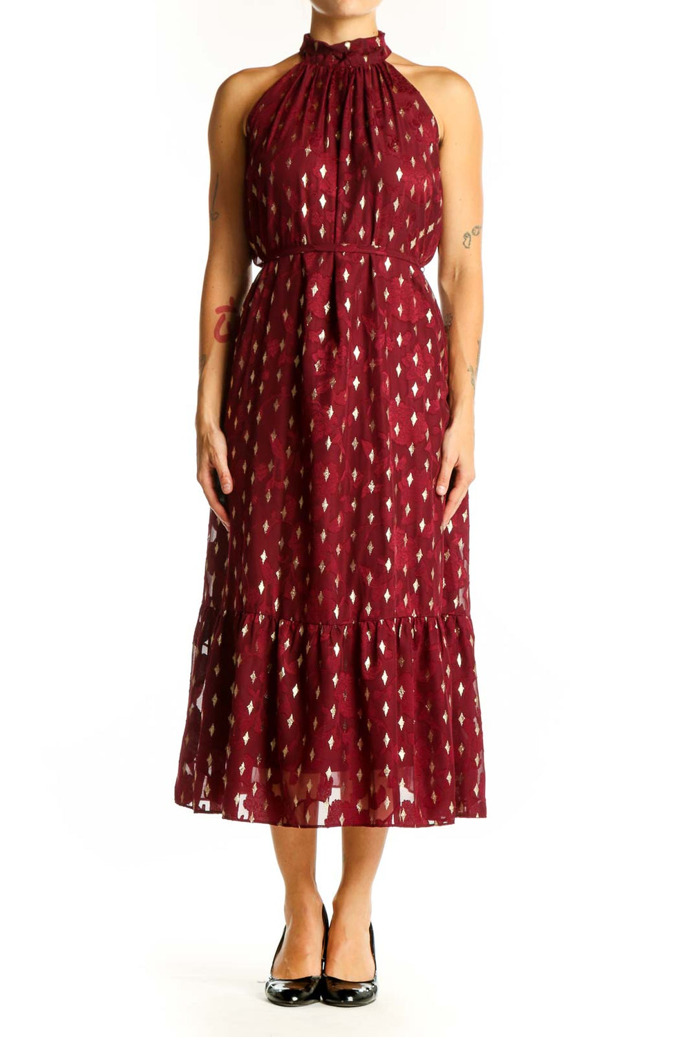 Front view of burgundy halter midi dress with gold diamond pattern