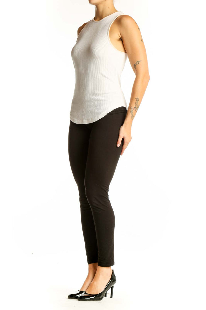 Front view of white ribbed sleeveless Sweaty Betty athletic top