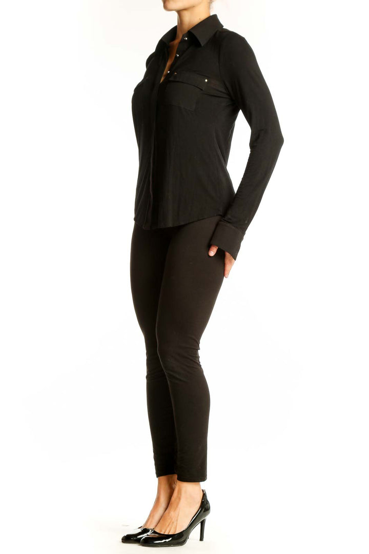 Front view of Black Button-Up Shirt from White House Black Market with front pockets