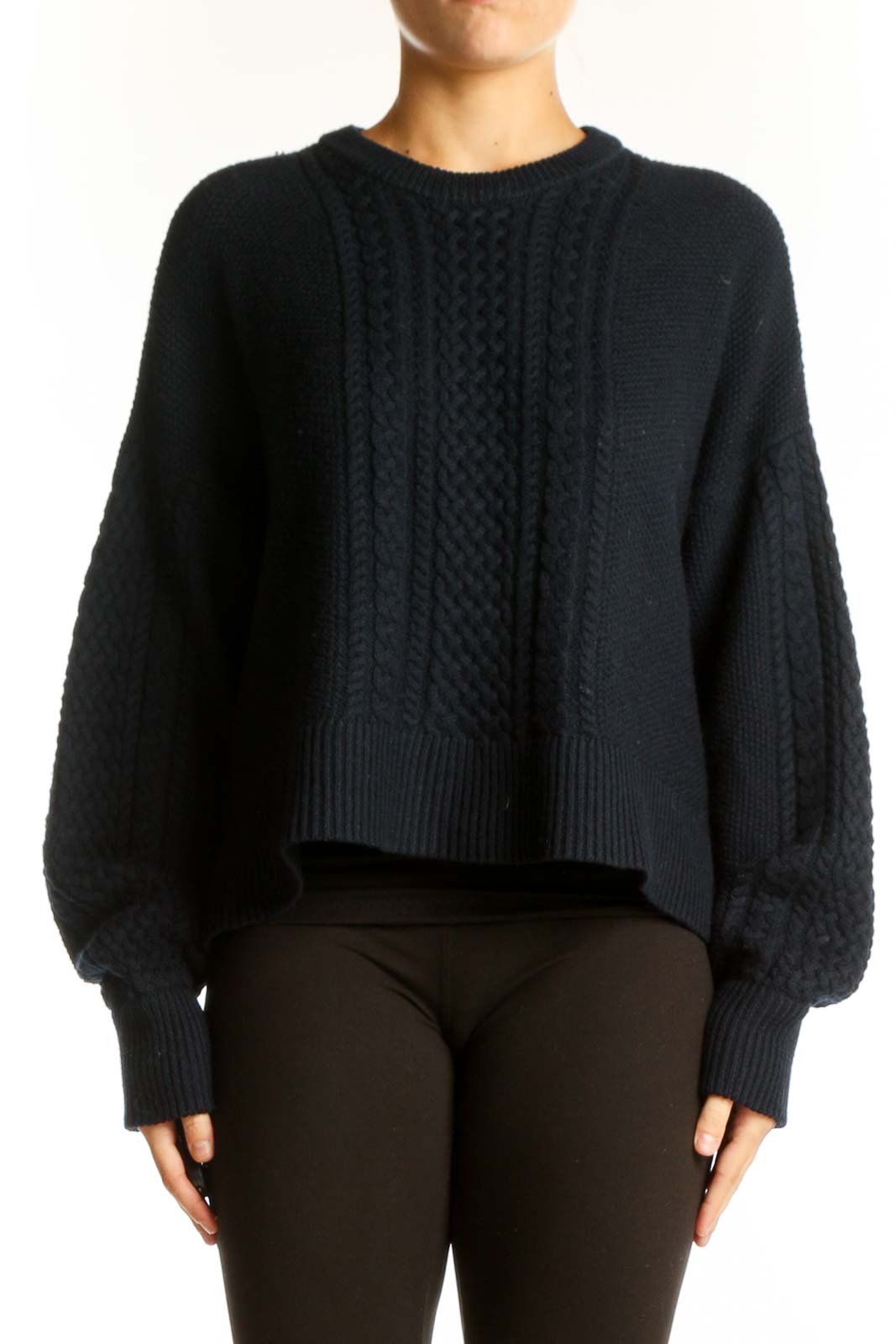 Front view of ATM black cable knit cropped sweater with balloon sleeves