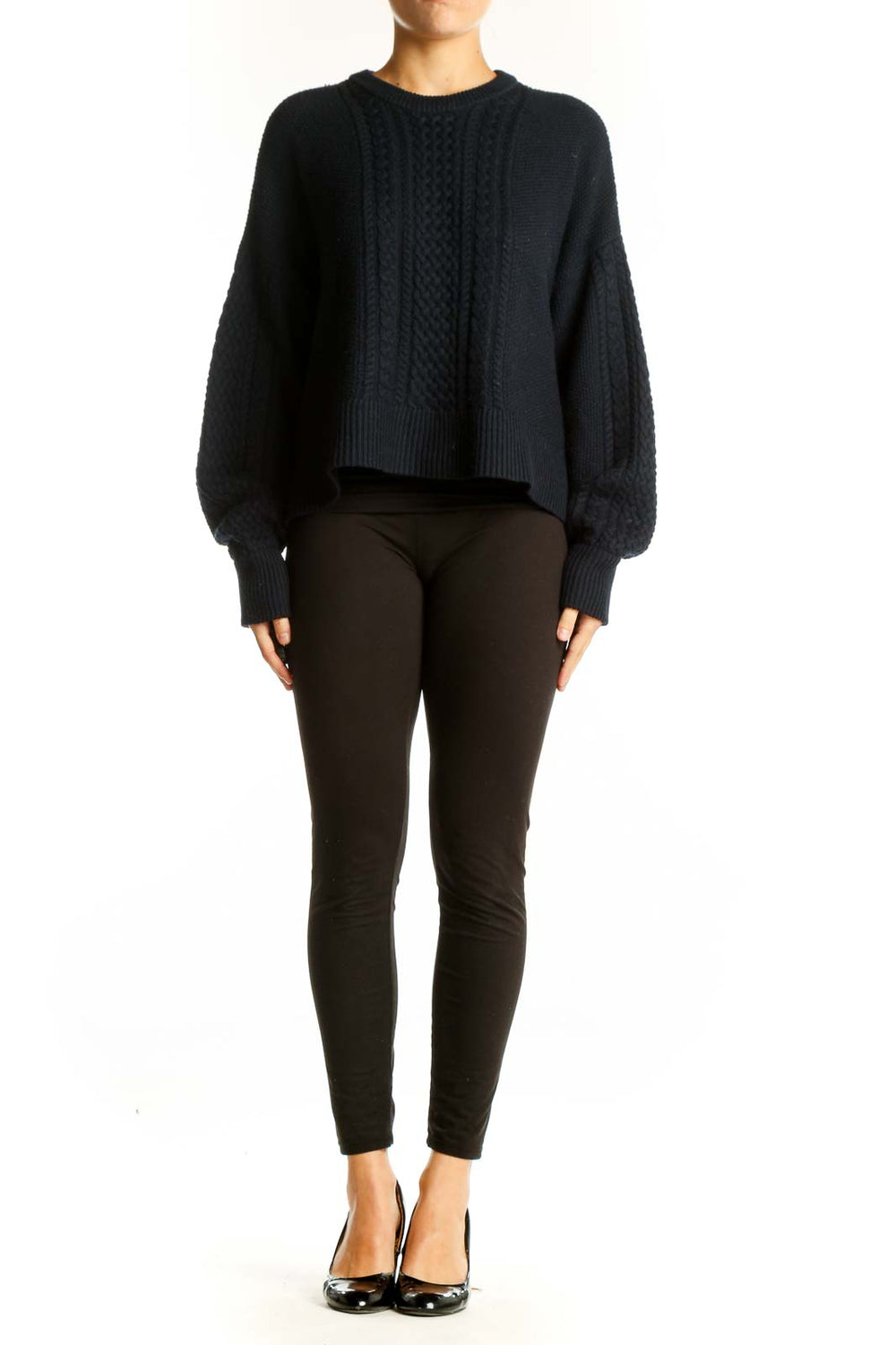 Front view of ATM black cable knit cropped sweater with balloon sleeves