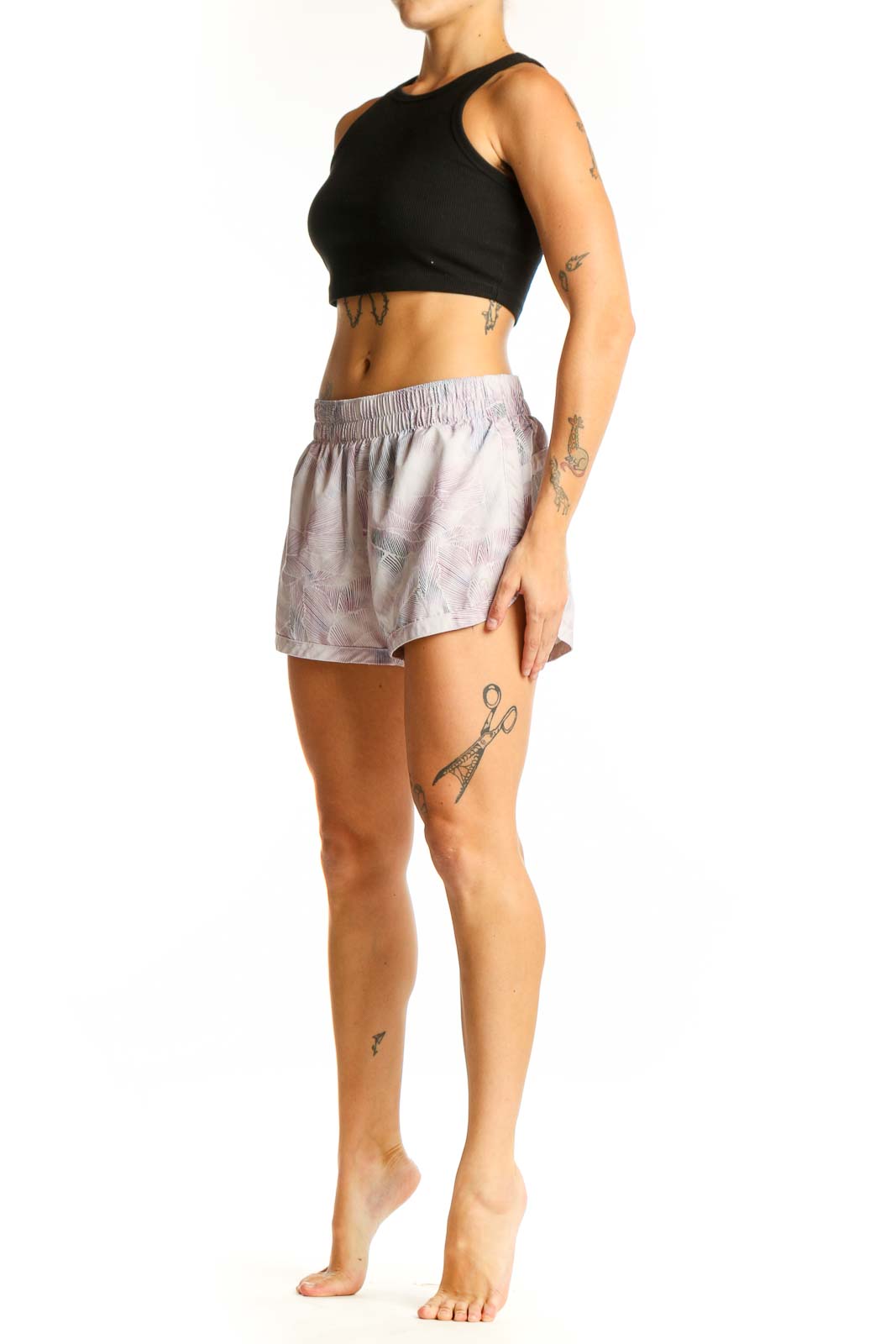 Front view of pink floral print GapFit athletic shorts