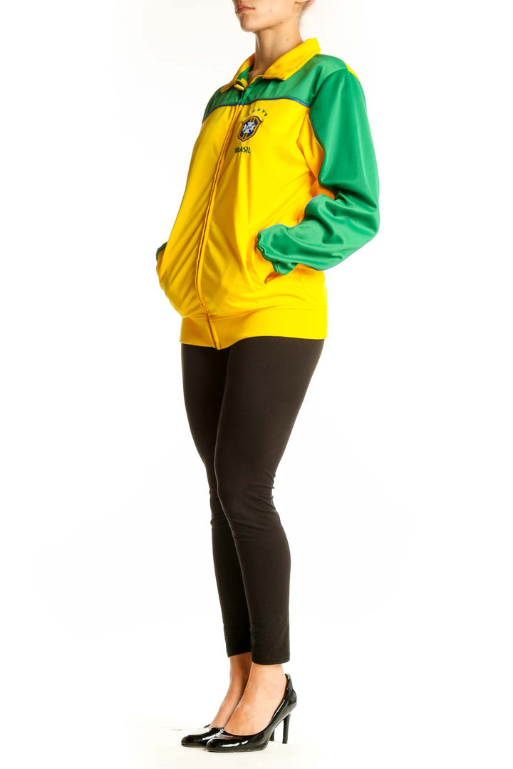 Front view of yellow and green CBF BRAZIL soccer jacket with team logo