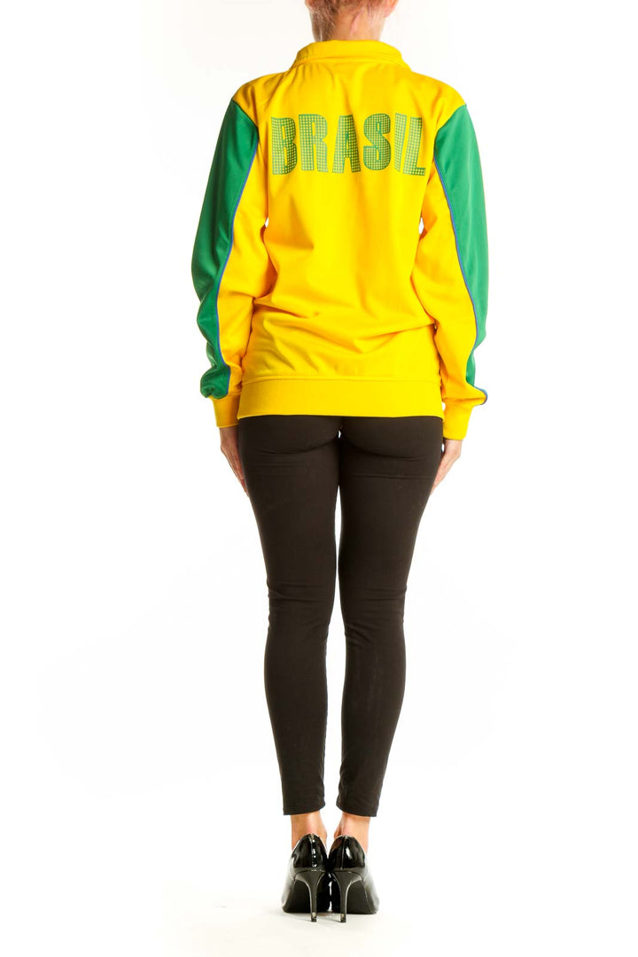 Back view of yellow and green CBF BRAZIL soccer jacket on model