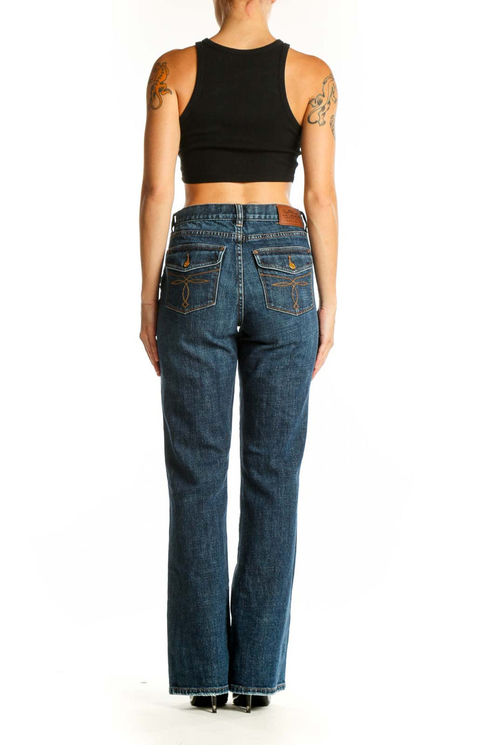 Side view of woman wearing Lauren Jeans Co. Ralph Lauren blue straight leg jeans