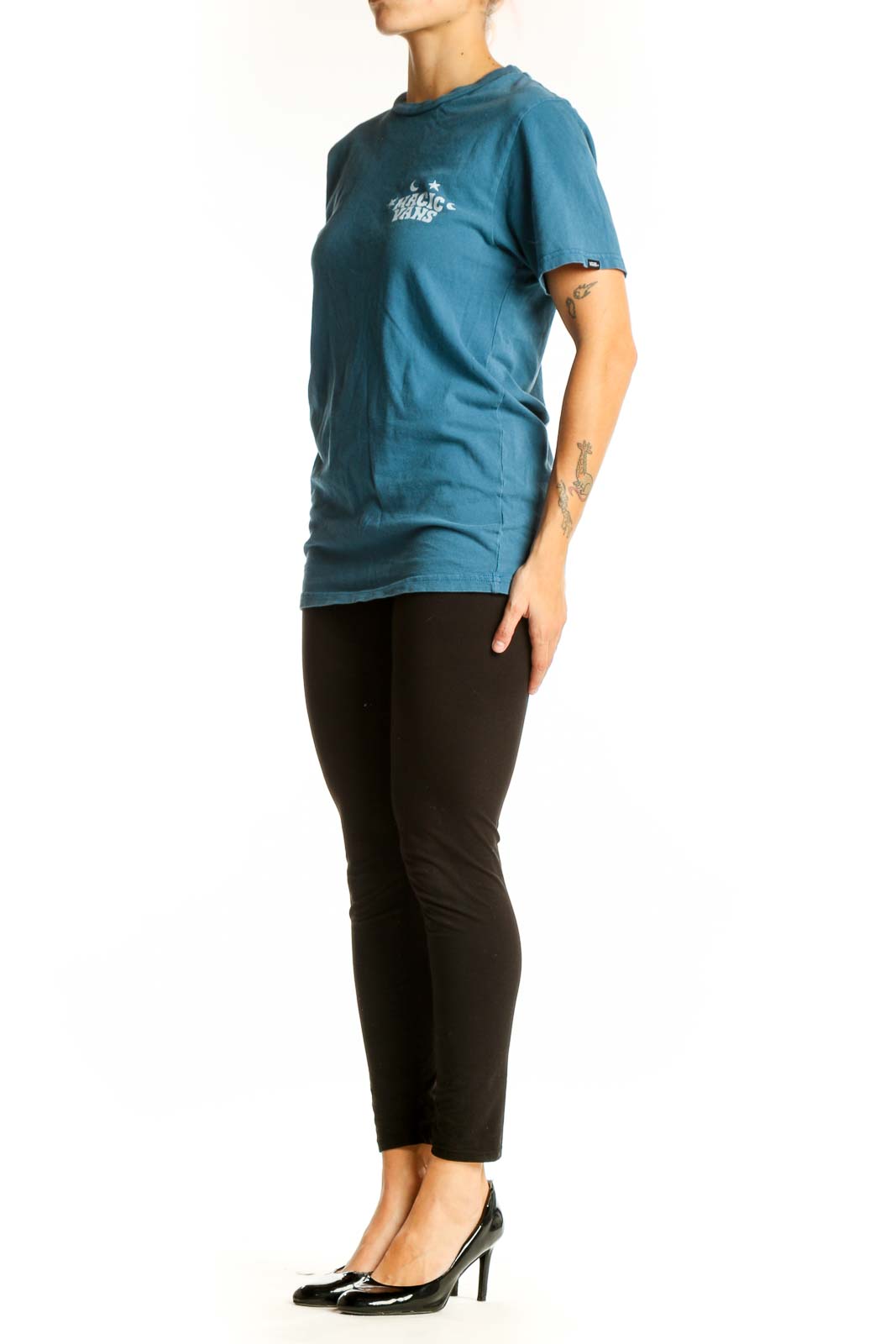 Front view of teal Vans t-shirt with 'Magic Vans' graphic print