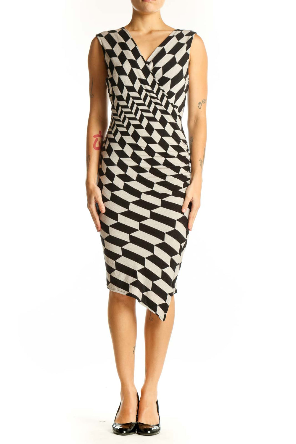 Front view of Tracy Reese black and white geometric print wrap dress with asymmetrical hem