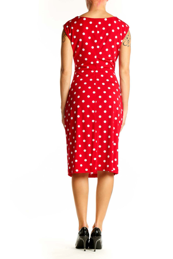 Side view of red polka dot cowl neck dress by Connected Apparel
