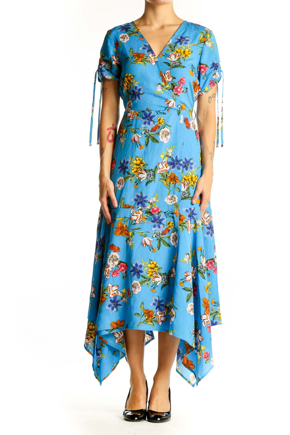 Front view of Calvin Klein blue floral wrap midi dress with handkerchief hem