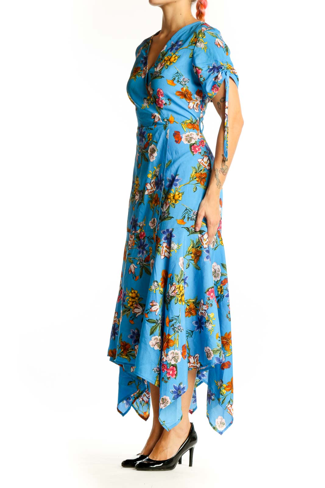 Front view of Calvin Klein blue floral wrap midi dress with handkerchief hem
