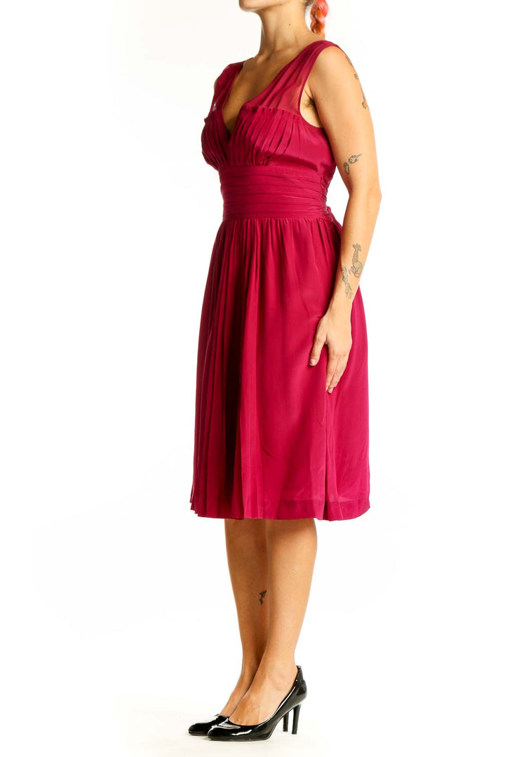Front view of red silk V-neck pleated cocktail dress by Tracy Reese