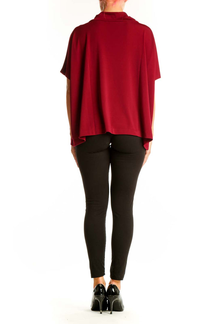 Side view of red Alfani cowl neck short sleeve blouse on model