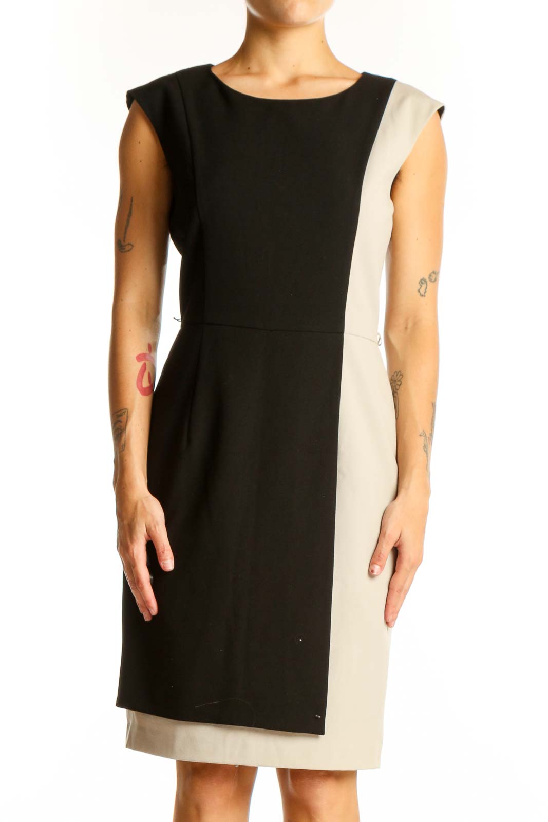 Front view of Calvin Klein black and beige color block sheath dress