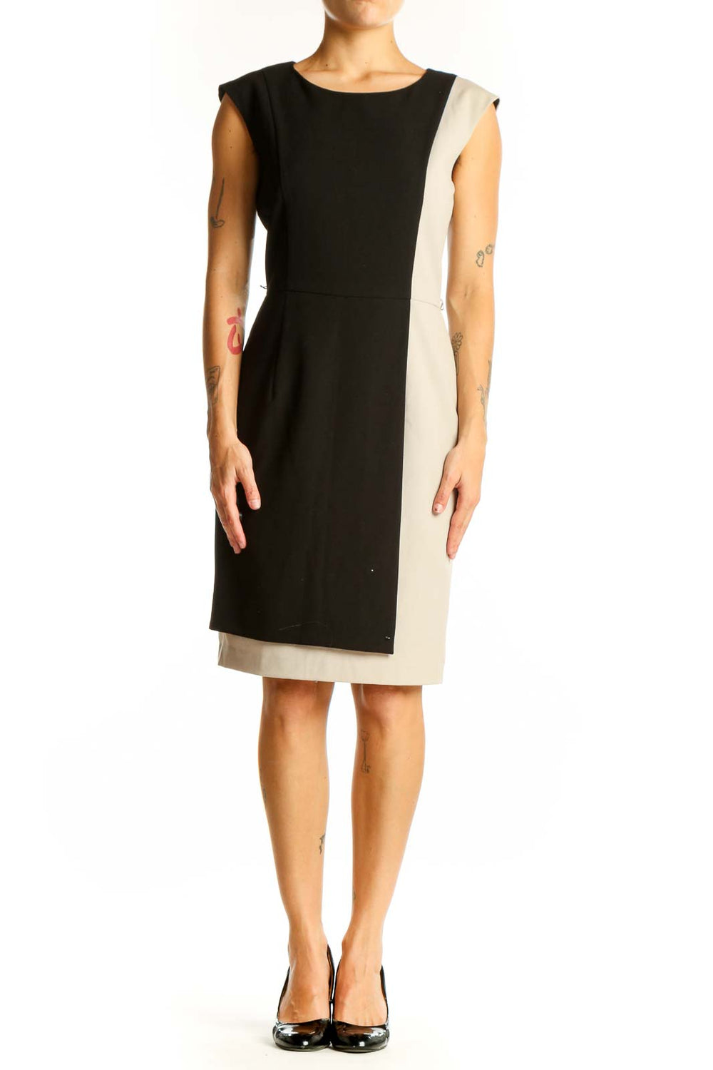 Front view of Calvin Klein black and beige color block sheath dress