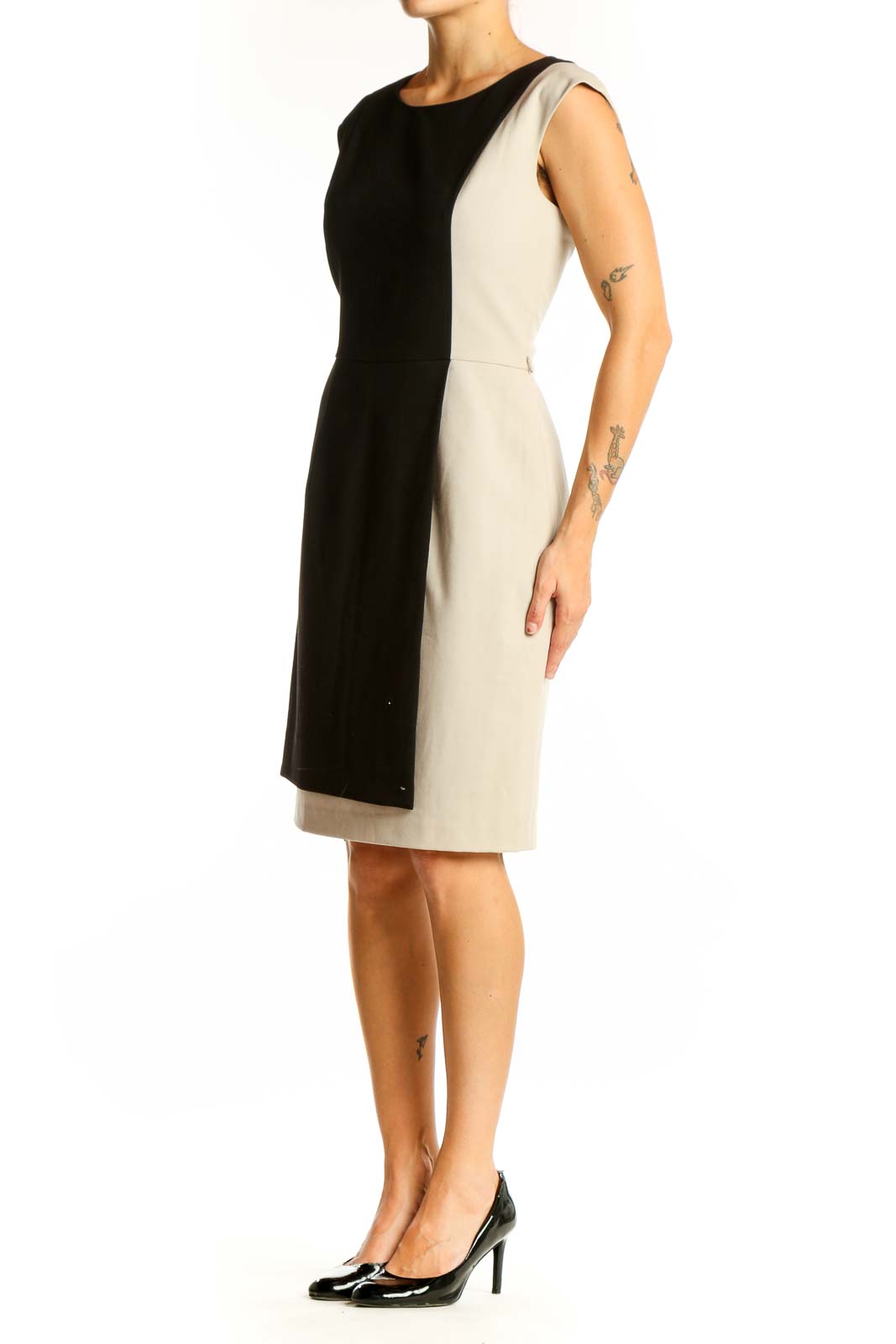 Front view of Calvin Klein black and beige color block sheath dress