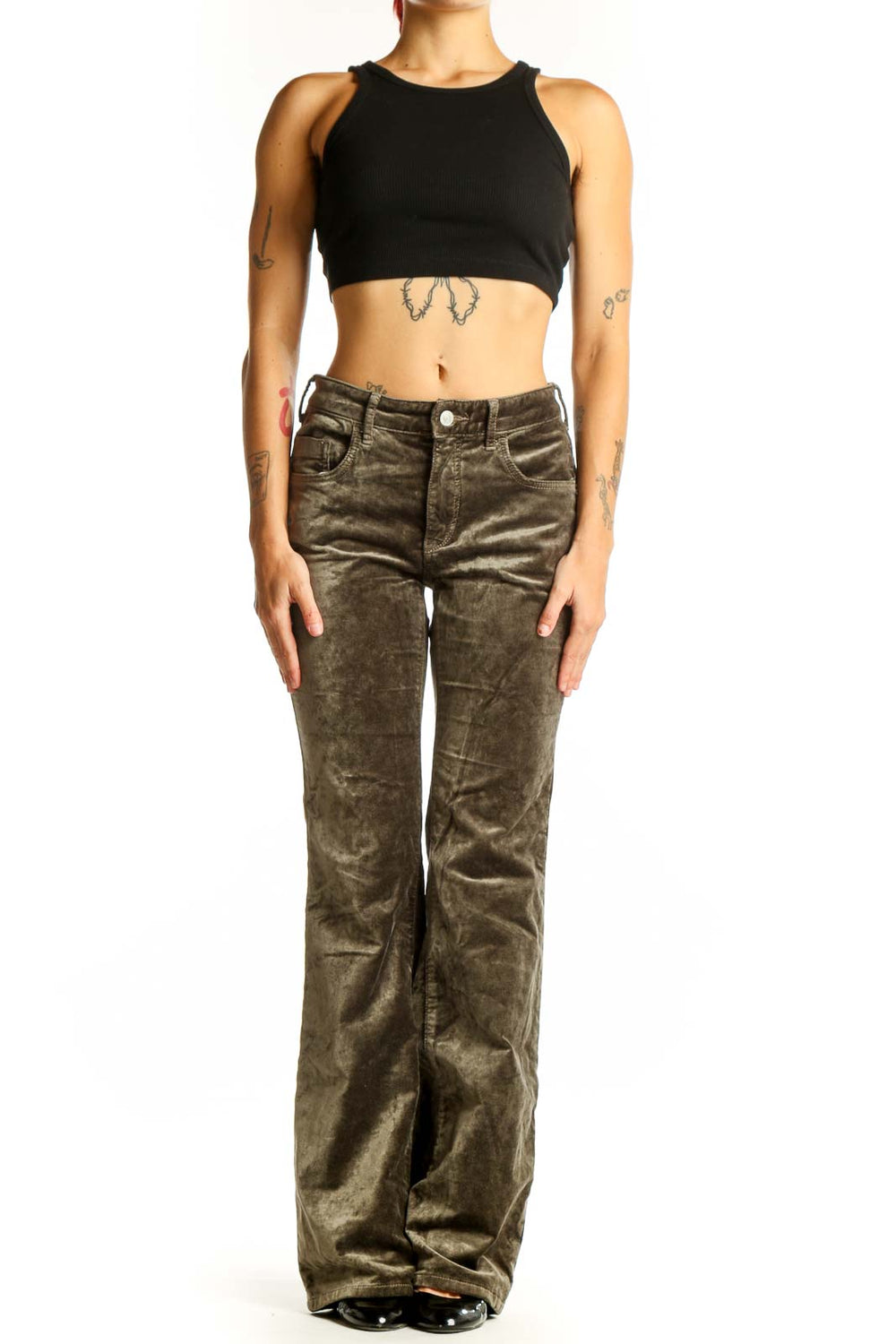 Front view of Pilcro olive velvet flare pants on model
