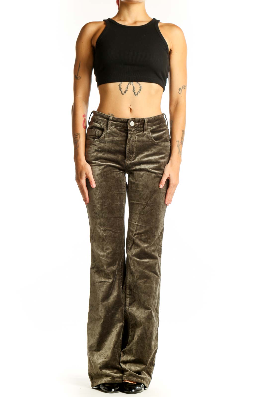 Front view of Pilcro olive velvet flare pants on model
