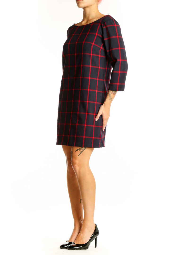 Front view of Mango black and red plaid shift dress with windowpane pattern