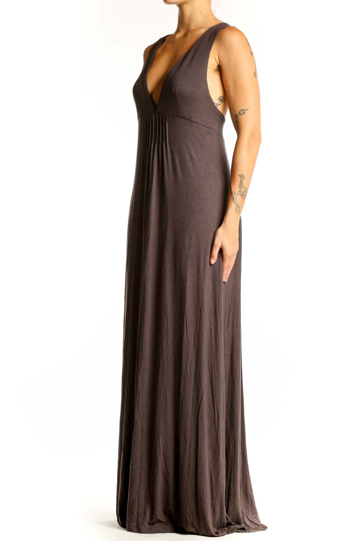 Front view of brown Mustard Seed maxi dress with plunging V-neckline