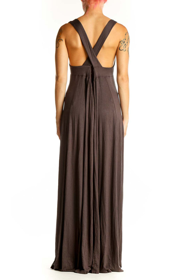 Side view of brown Mustard Seed maxi dress showing flowing silhouette