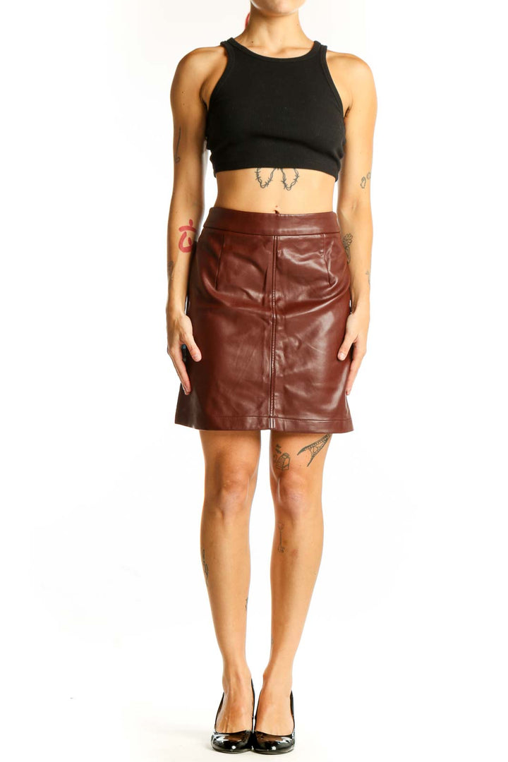 Front view of French Connection brown faux leather mini skirt