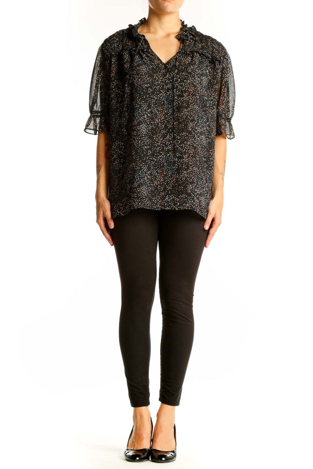 Front view of Pleione black speckled sheer blouse with ruffle-neck