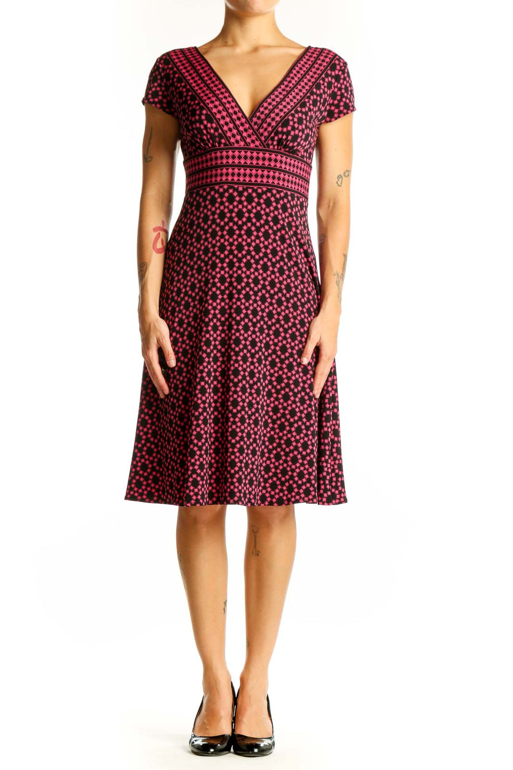Front view of Maggy London pink polka dot V-neck midi dress