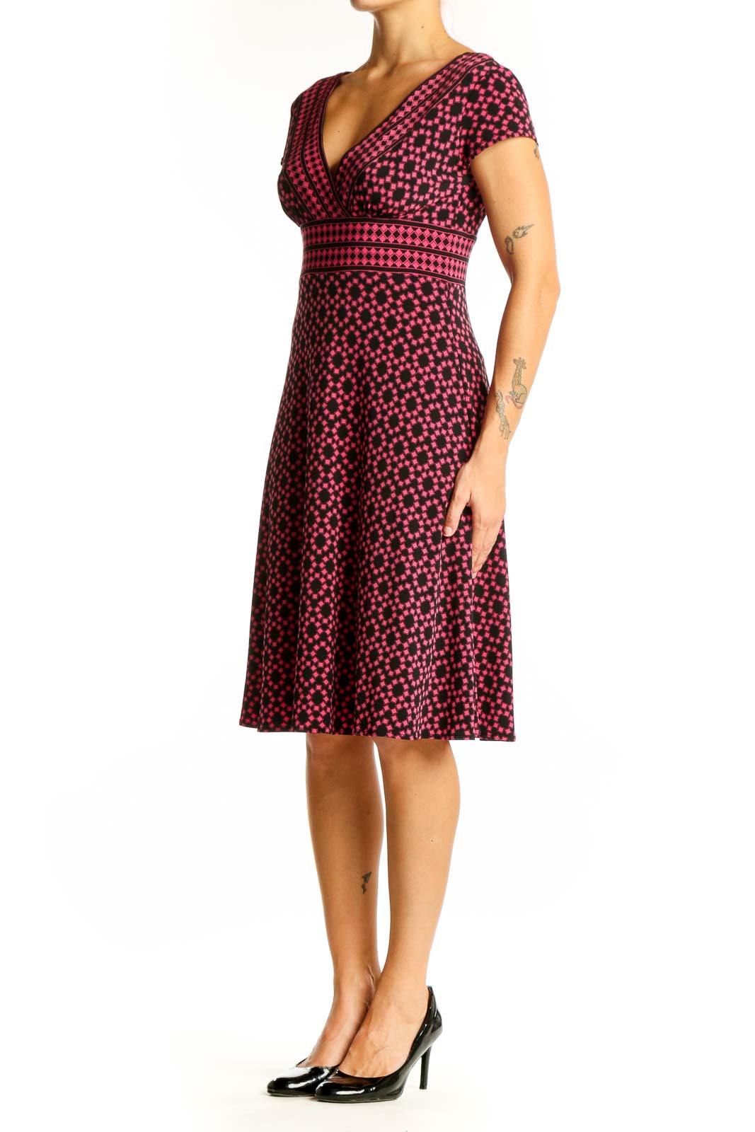 Front view of Maggy London pink polka dot V-neck midi dress