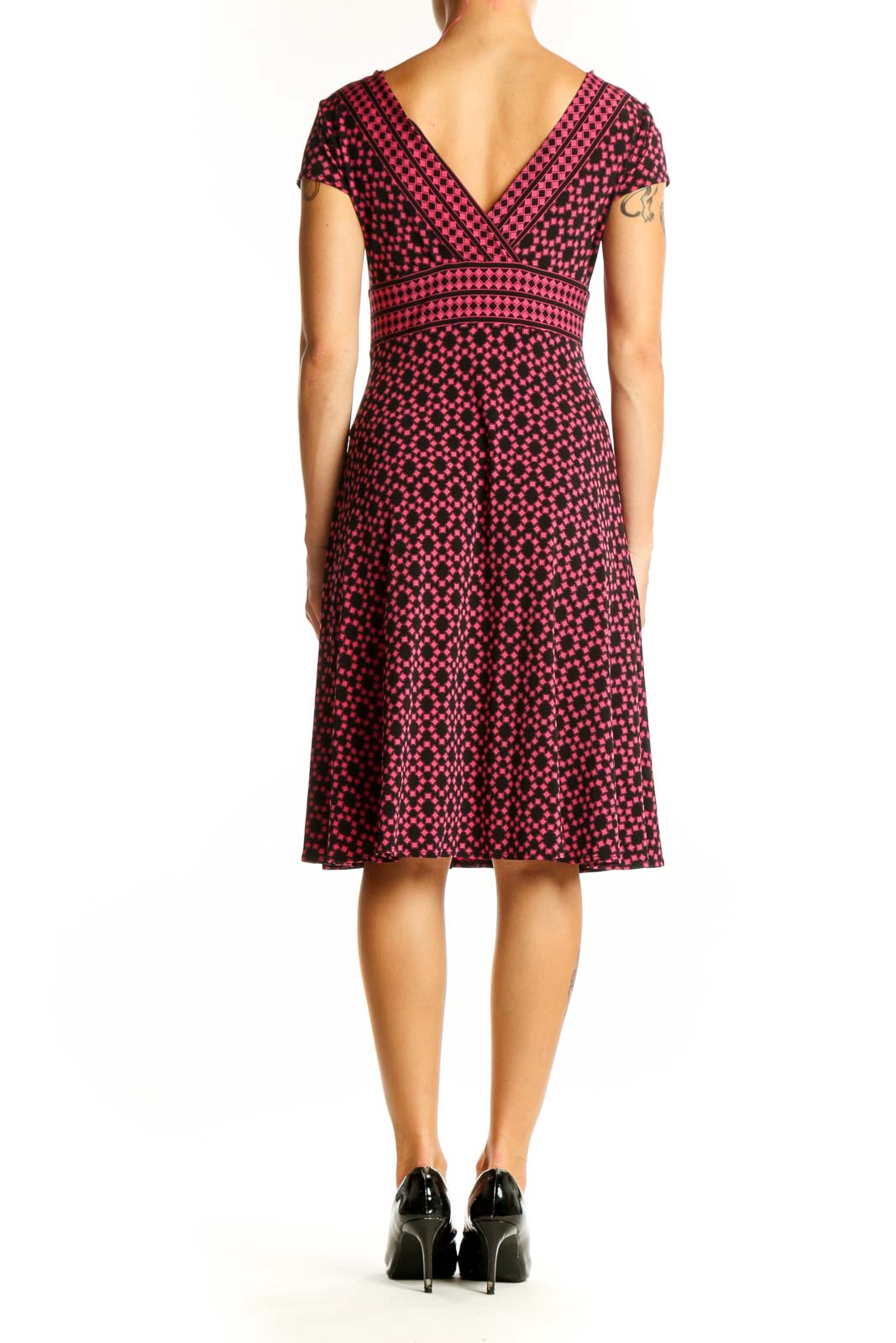 Side view of Maggy London pink polka dot V-neck midi dress
