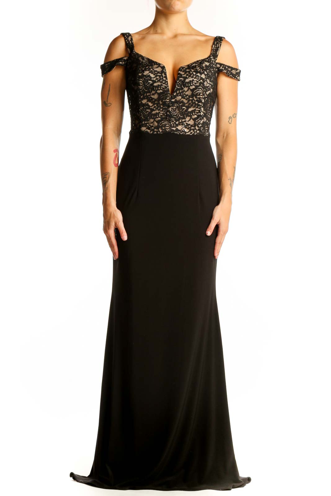 Front view of black lace Xscape evening gown with cold shoulder design