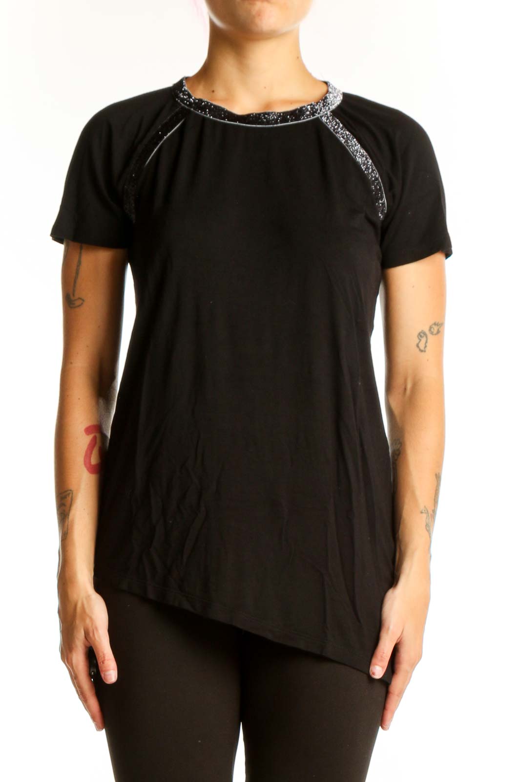 Front view of Design History black asymmetrical short sleeve top with sparkle trim