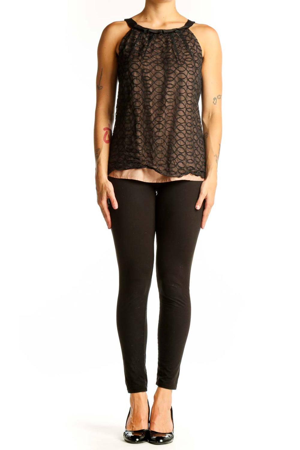 Front view of Kenar Black Lace Overlay Sleeveless Top with nude underlay