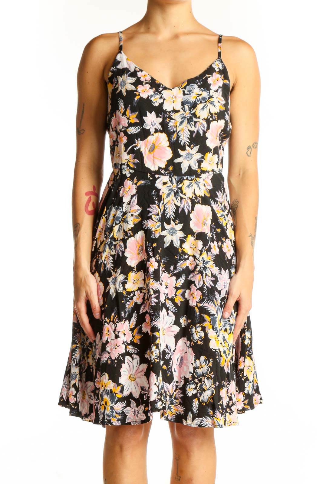 Front view of black floral Gap dress with spaghetti straps and sweetheart neckline