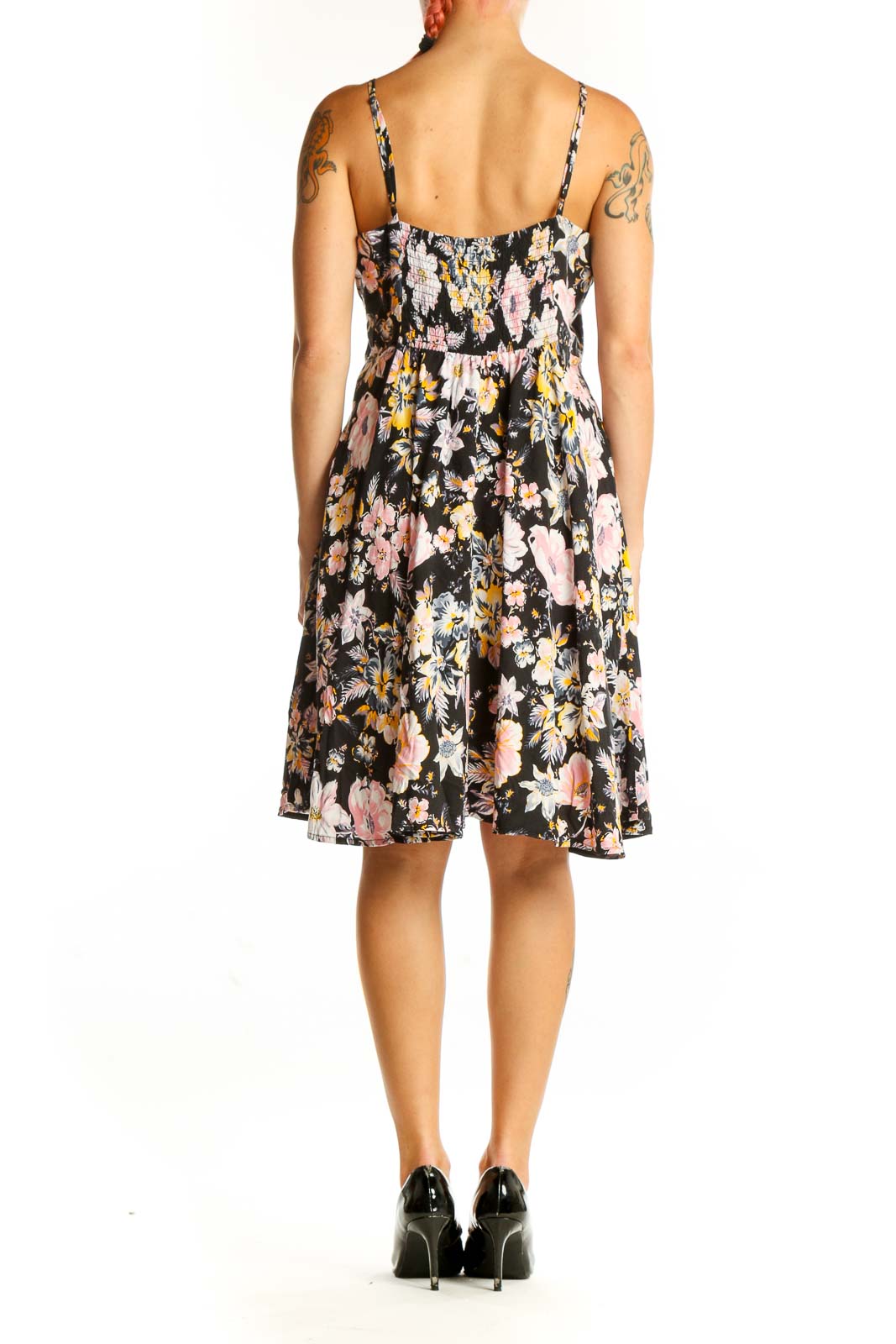 Back view of black floral Gap dress showing A-line silhouette and all-over floral print