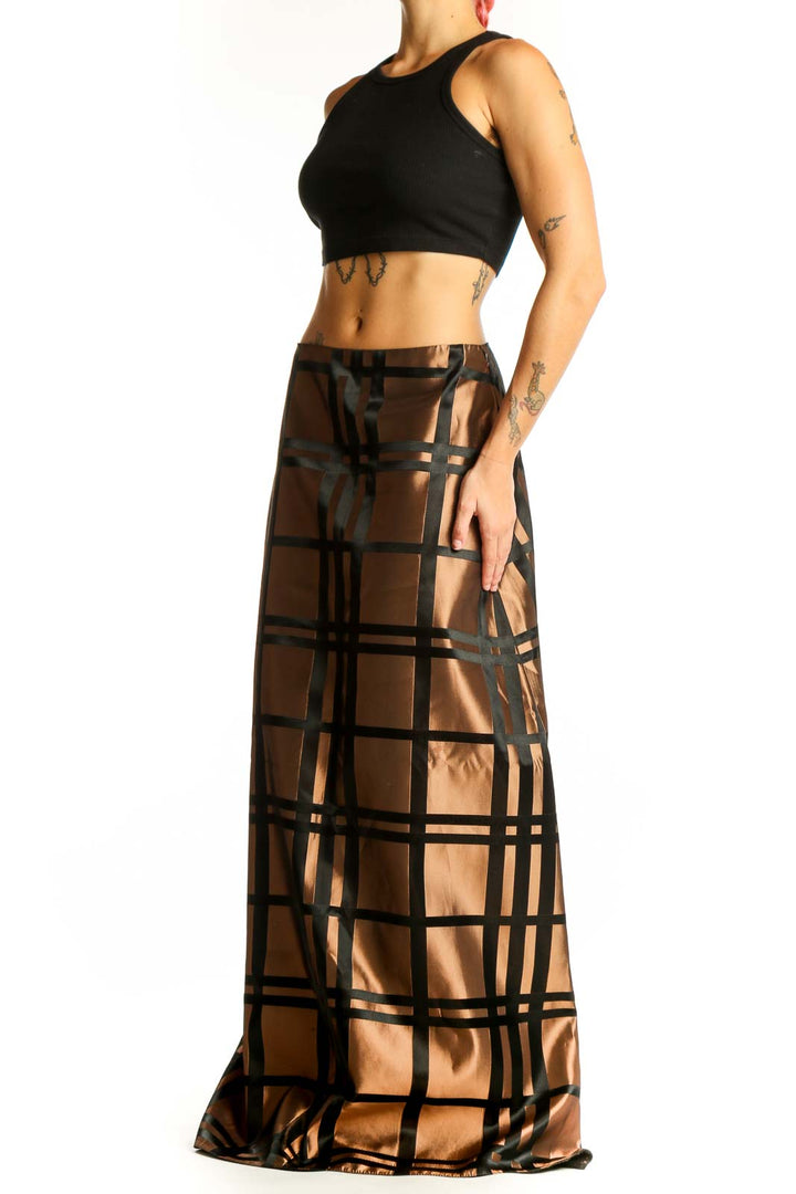 Front view of JS Collections bronze plaid maxi skirt with black grid pattern
