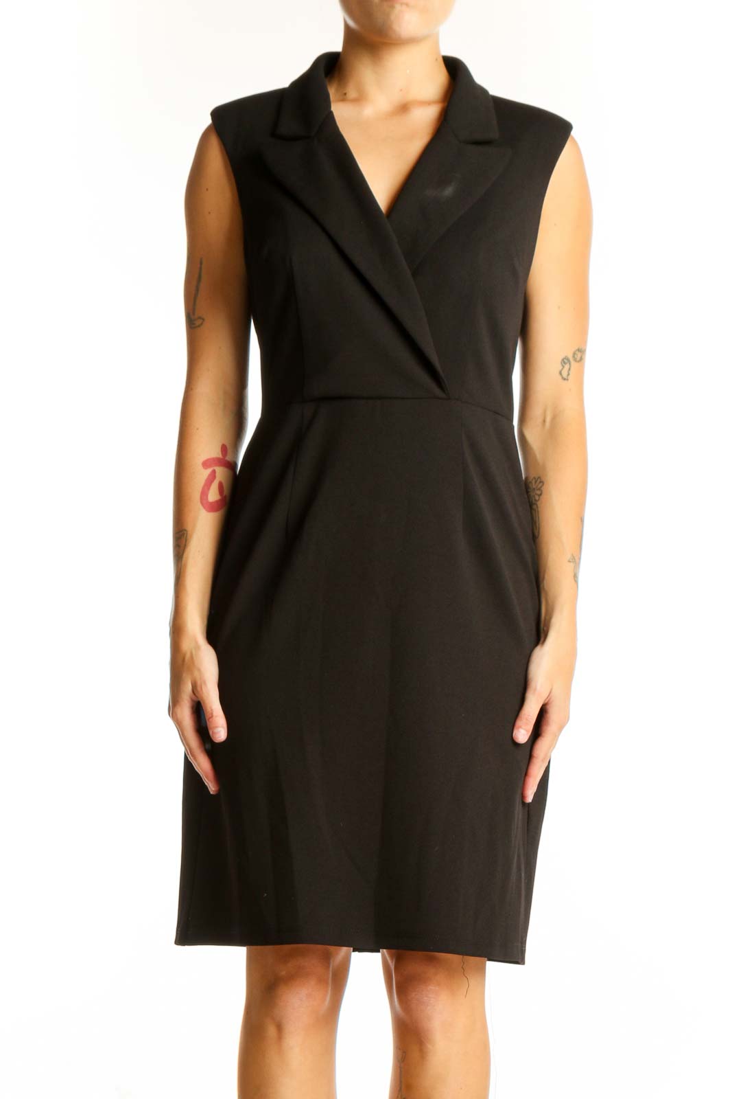 Front view of Donna Morgan black sleeveless wrap dress on model