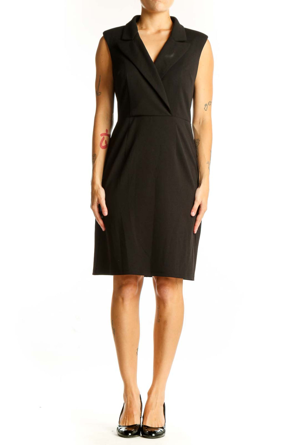Front view of Donna Morgan black sleeveless wrap dress on model