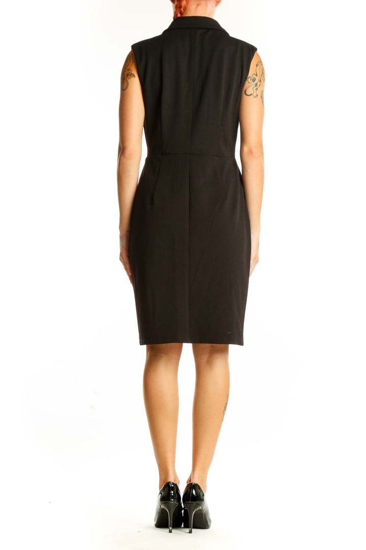 Side view of Donna Morgan black sleeveless wrap dress on model