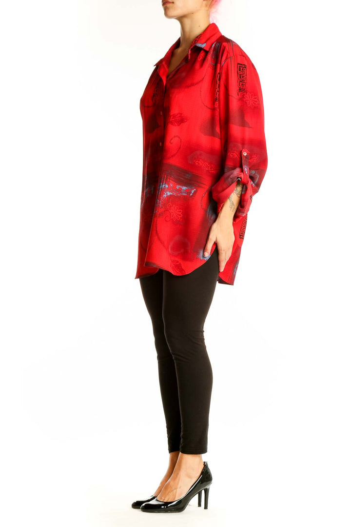 Front view of red floral print oversized button-down shirt