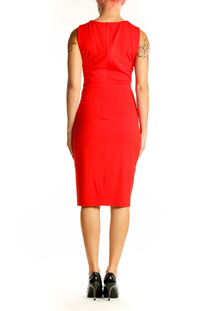 Side view of red sleeveless ruched bodycon dress by Cache showing figure-hugging silhouette