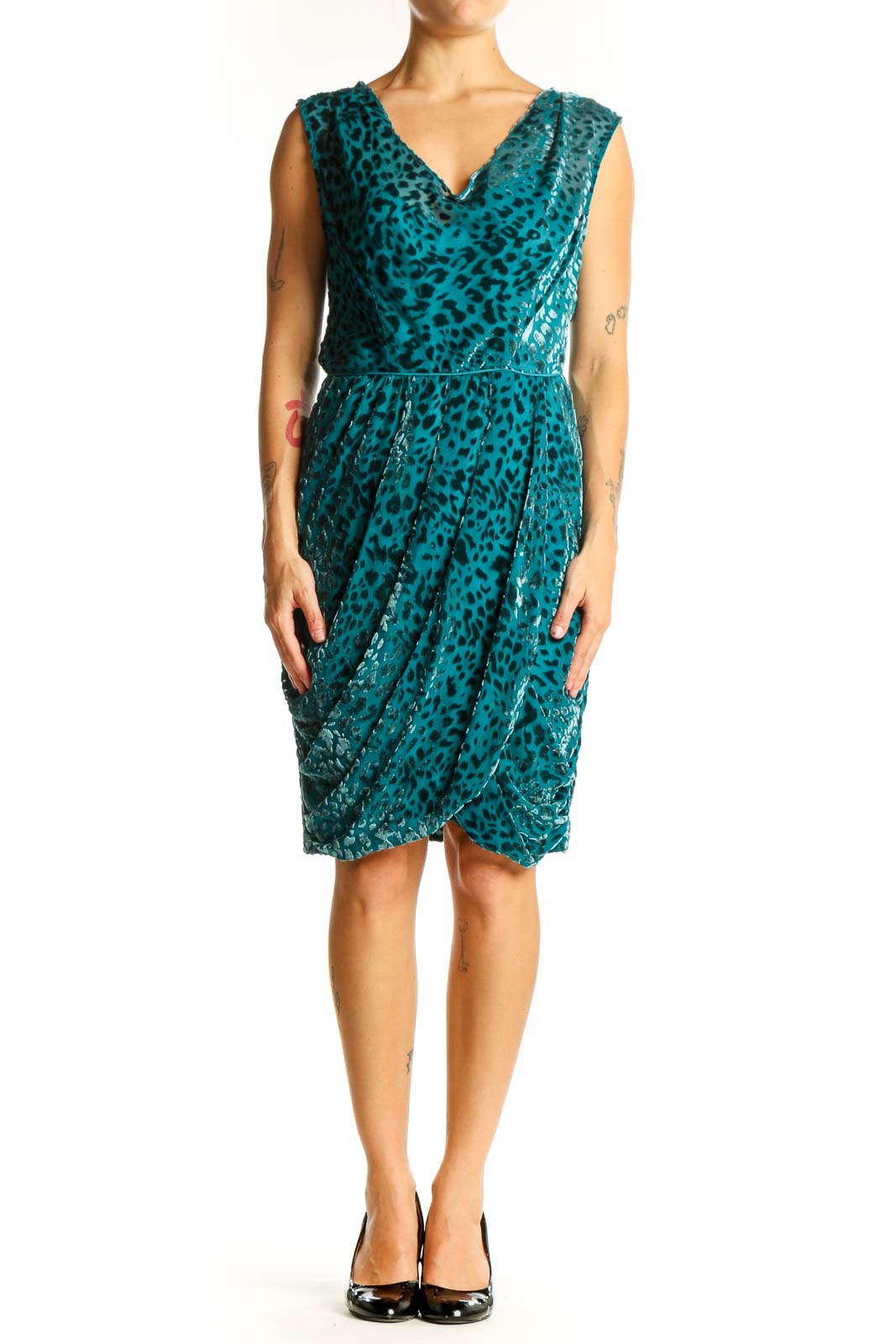 Front view of teal leopard print velvet cocktail dress with V-neck and wrap style