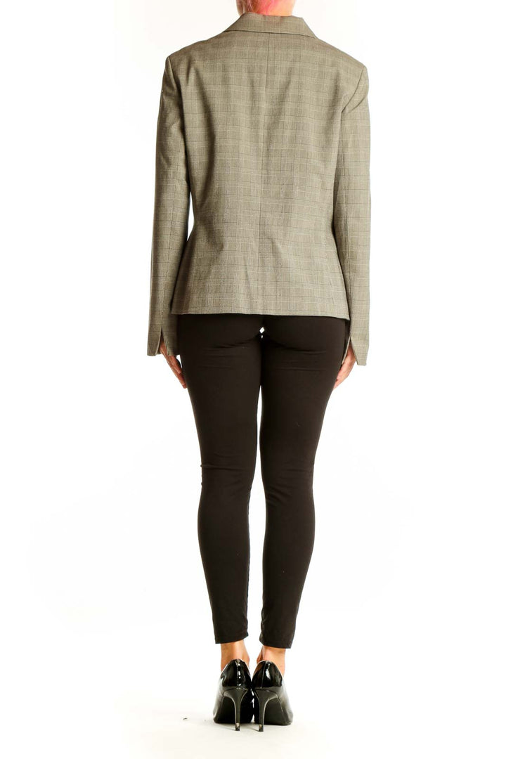 Back view of Casual Corner gray plaid blazer showing tailored fit and length
