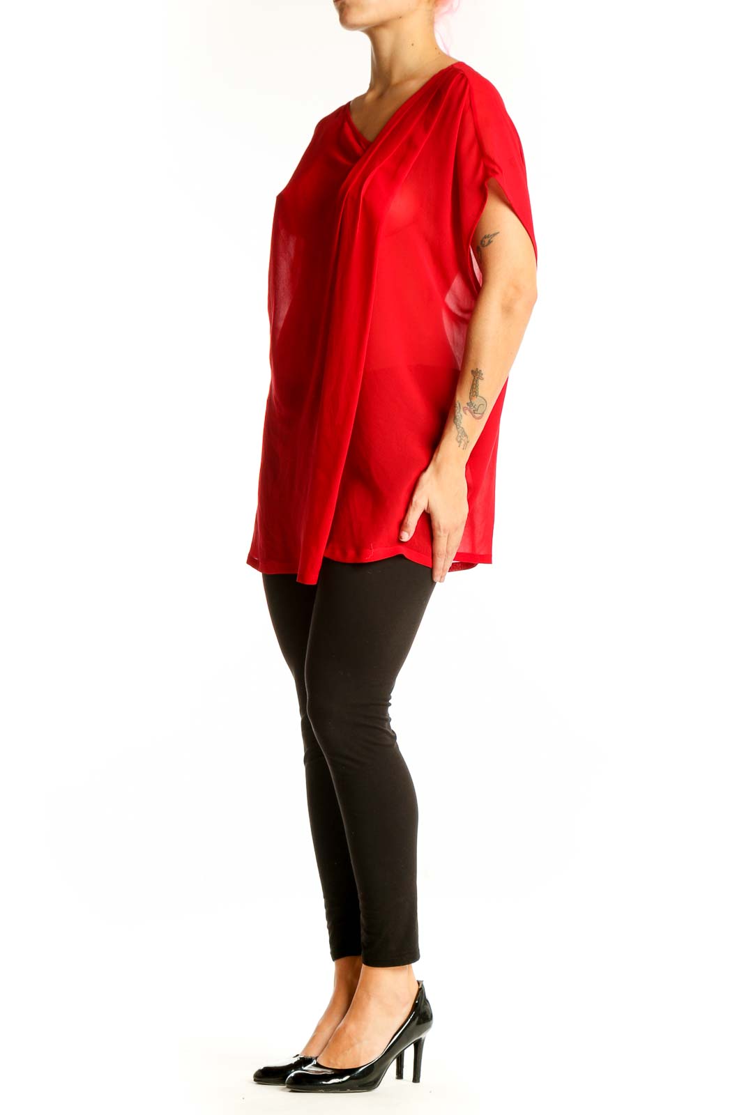 Front view of red asymmetrical pure DKNY top with draped design