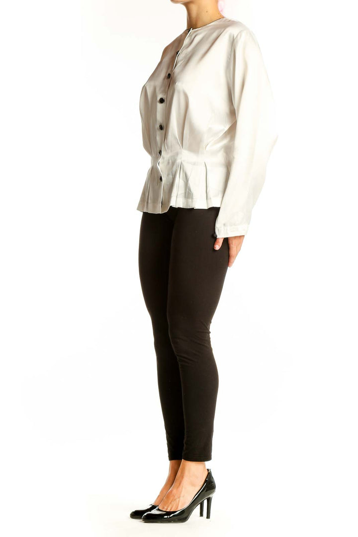 Front view of white Josephine polyester blouse with button-down design and peplum waist