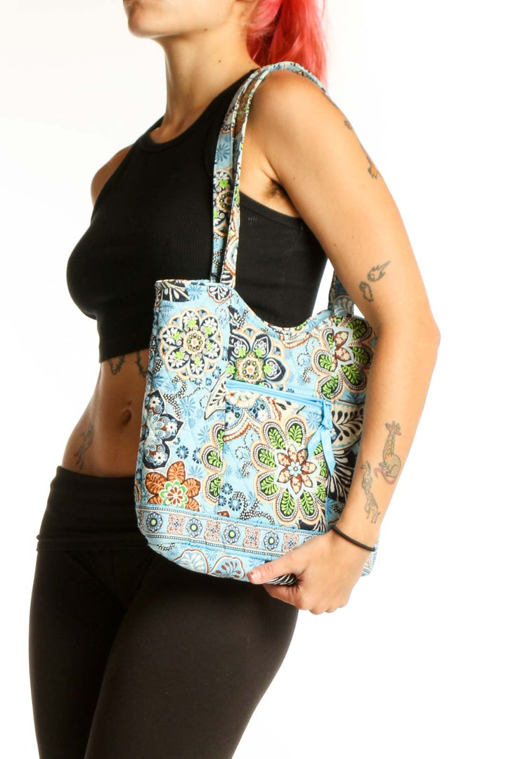 Front view of Vera Bradley Blue Floral Quilted Tote Bag with long straps