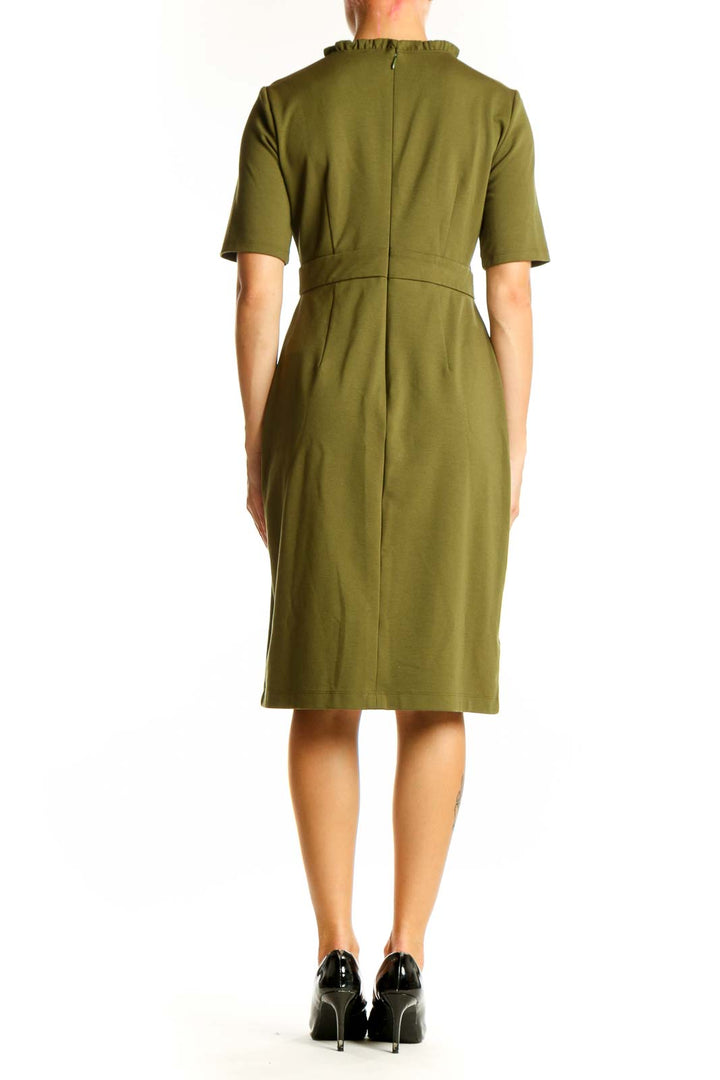 Side view of Ann Taylor olive sheath dress showing silhouette