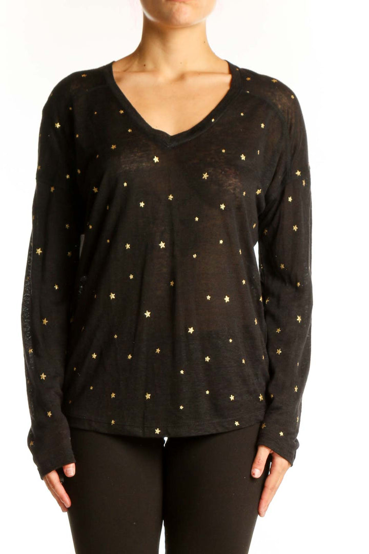 Front view of Rails black long-sleeve top with gold star prints and V-neckline